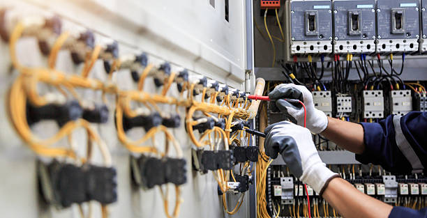 Professional Electrician technician working in Highland, IL